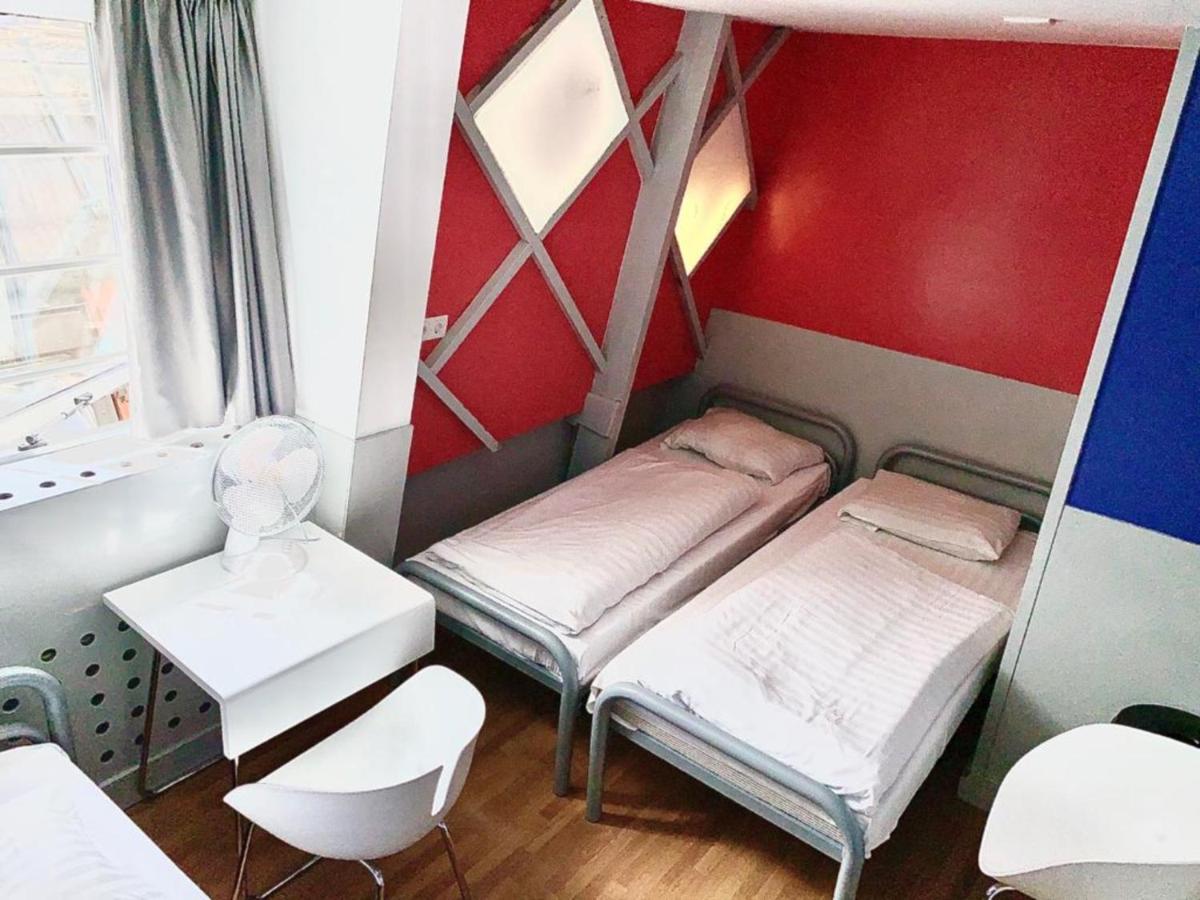 Dreibettzimmer mit Gemeinschaftsbad